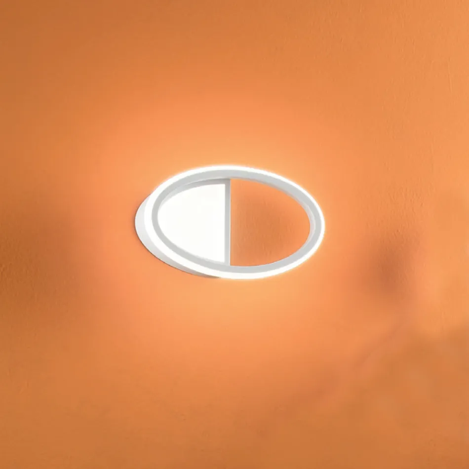 LED nástěnné svítidlo s bílou nebo zlatou kovovou konstrukcí - Raissa Viadurini