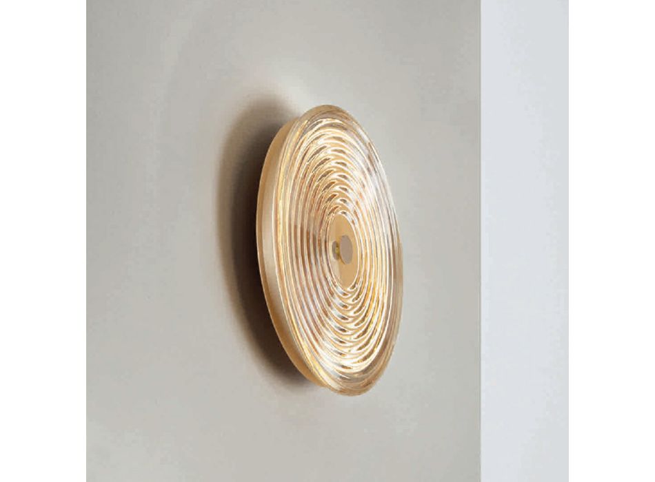 Nástěnná lampa z lakovaného kovu a skla zdobená soustřednými liniemi - Hackberry Viadurini