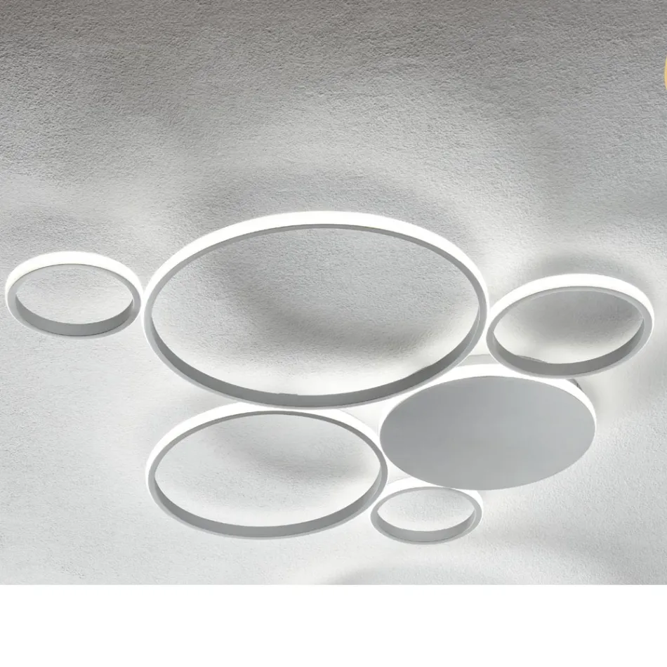 Moderní nástěnná LED lampa ve zlatém nebo stříbrném lakovaném kovu - Punto Viadurini