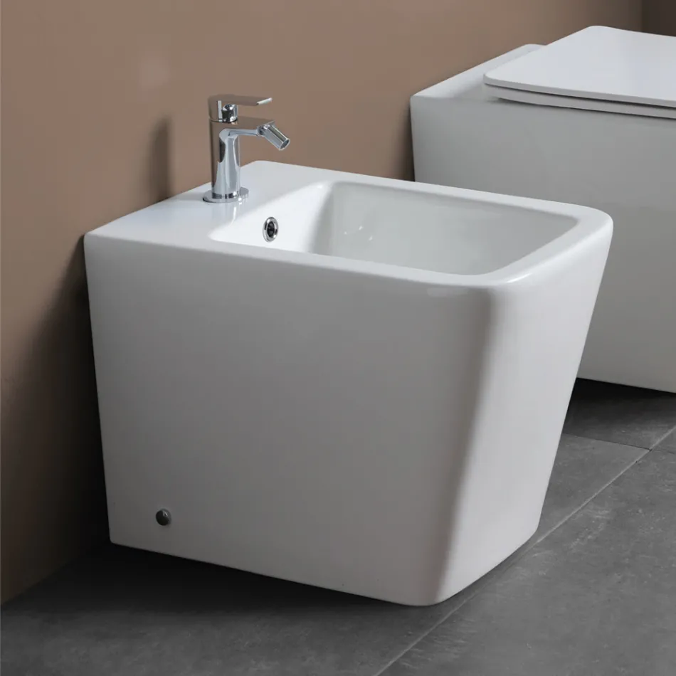 Jednootvorový bidet montovaný na podlahu z bílé keramiky s elegantním moderním designem - Giunco Viadurini