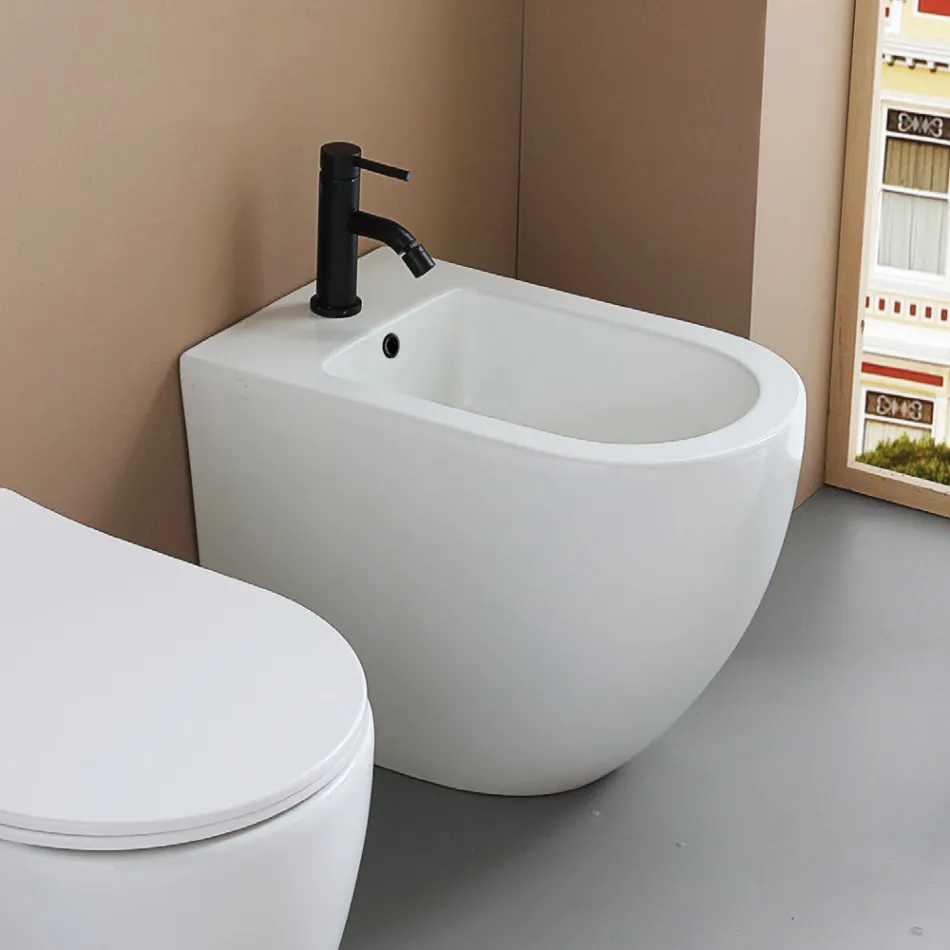 Jednootvorový bidet montovaný na podlahu z odolné bílé keramiky s moderním designem - Olmo Viadurini