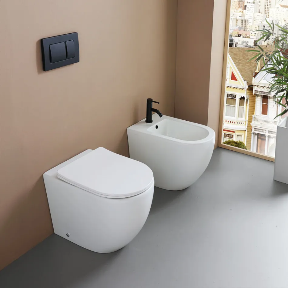 Jednootvorový bidet montovaný na podlahu z odolné bílé keramiky s moderním designem - Olmo Viadurini