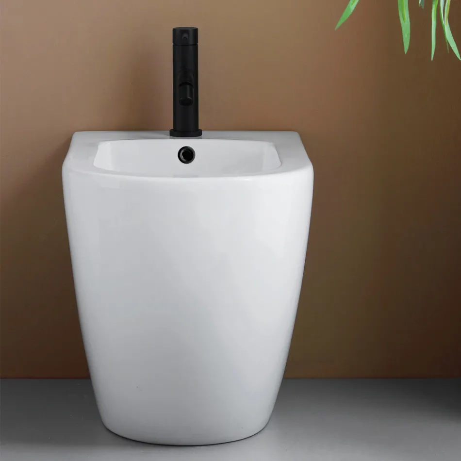Jednootvorový bidet montovaný na podlahu z odolné bílé keramiky s moderním designem - Olmo Viadurini