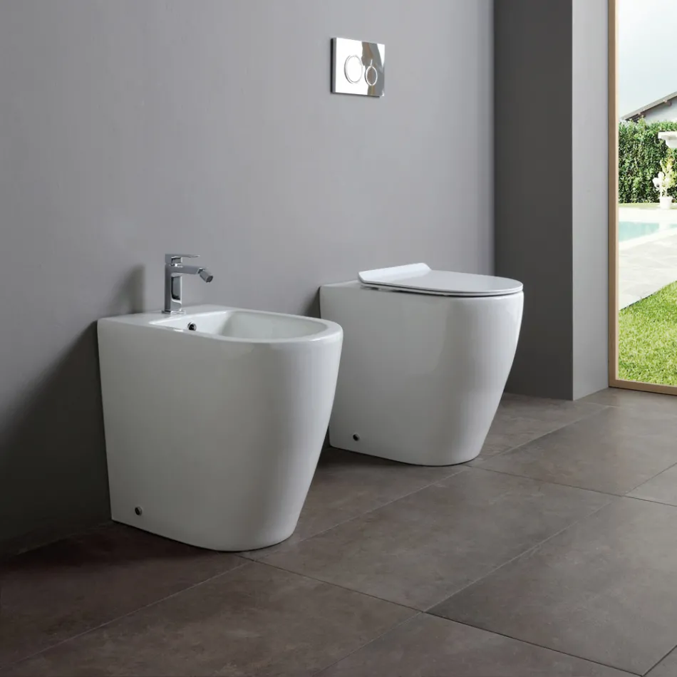 Jednootvorový bidet s posunutým odtokem z keramiky s moderním designem - Oleandro  Viadurini
