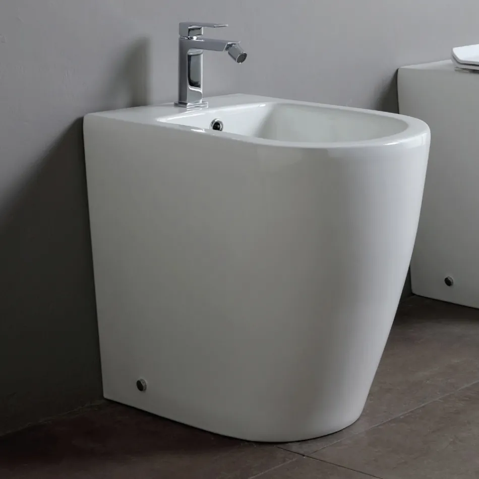Jednootvorový bidet s posunutým odtokem z keramiky s moderním designem - Oleandro  Viadurini