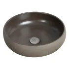 Šedá kompozice koupelny s kulatým zrcadlem a různými doplňky - Maryse Viadurini