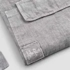 Antracitově šedá lněná kuchyňská zástěra Nízký model s kapsou - Flick Viadurini