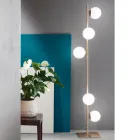 Moderní stojací lampa v černém nebo zlatém kovu a foukaném skle - Birga Viadurini