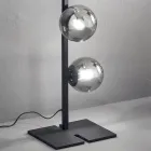 Moderní stojací lampa v černém nebo zlatém kovu a foukaném skle - Birga Viadurini