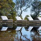 Venkovní lehátko s kolečky z ručně tkaného polyratanu - Gigi Viadurini