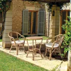 Stohovatelné venkovní křeslo v zahradě přírodního ratanu - Spora Viadurini