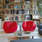 Houpací křeslo s kulatým tvarem Slide Blos barevný design vyrobené v Itálii Viadurini