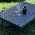 Venkovní obývací pokoj s pohovkou, křeslem a obdélníkovým konferenčním stolkem - Dandelium Viadurini