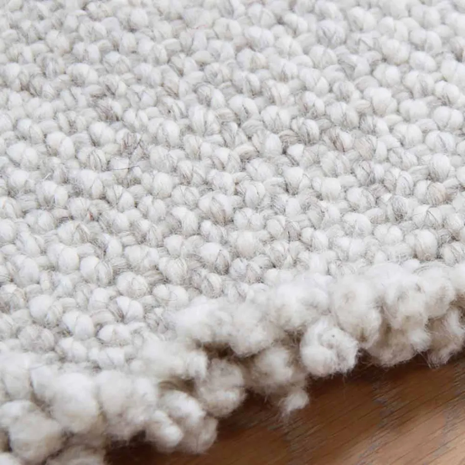 Velký a moderní design lemovaný vlněný koberec černý nebo krémový - Jacqueline Viadurini