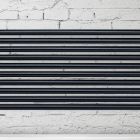 Hydraulický radiátor se svislými kolektory a vodorovným potrubím - Složený Viadurini