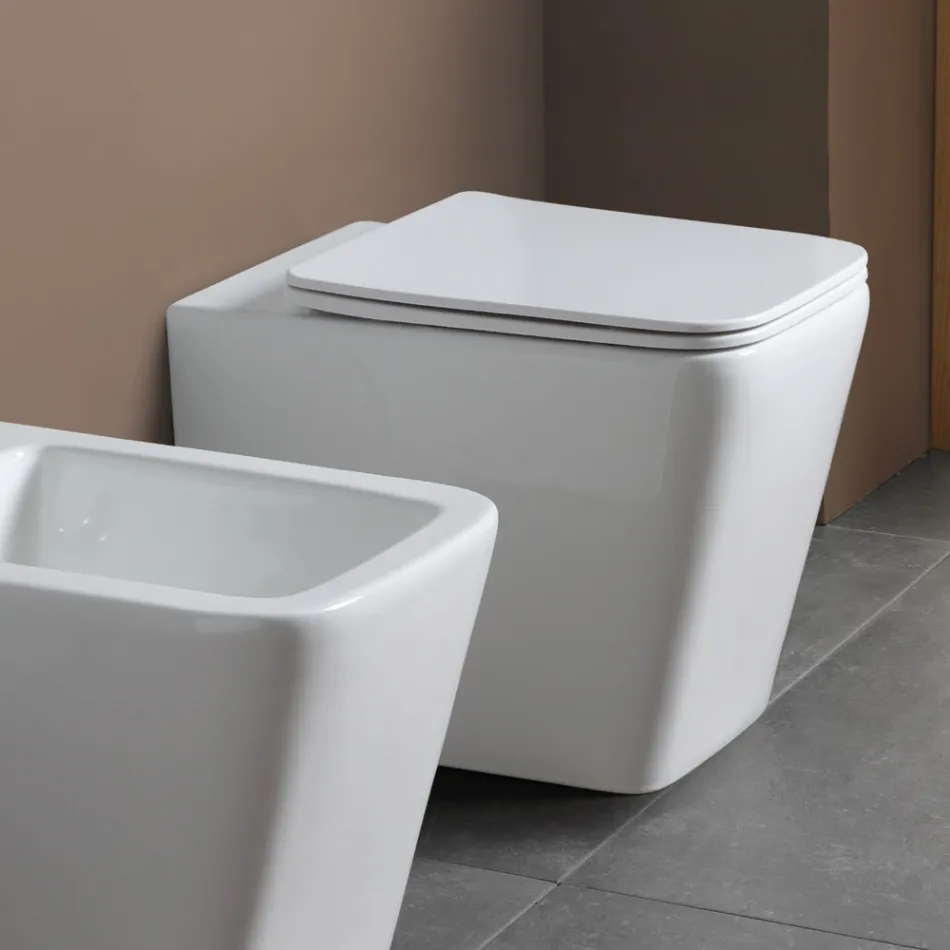 WC k podlaze s keramickým sedátkem s tlumeným dovíráním a moderním designem - Giunco Viadurini