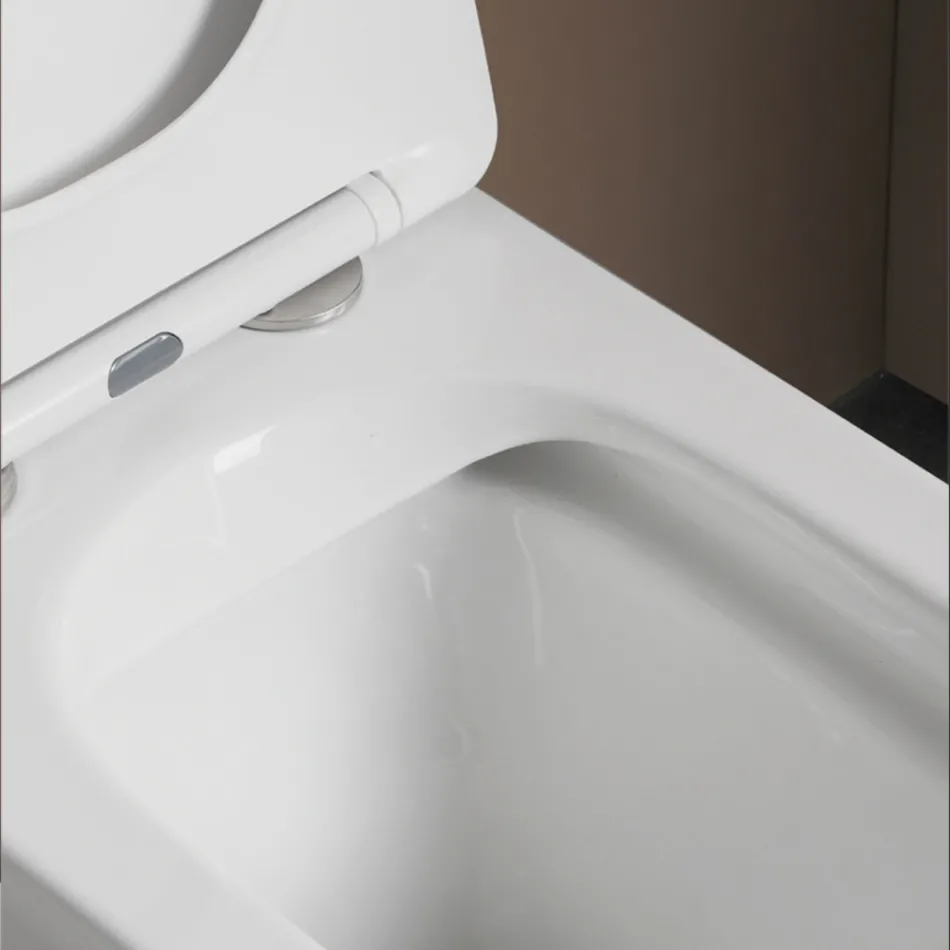 WC k podlaze s keramickým sedátkem s tlumeným dovíráním a moderním designem - Giunco Viadurini