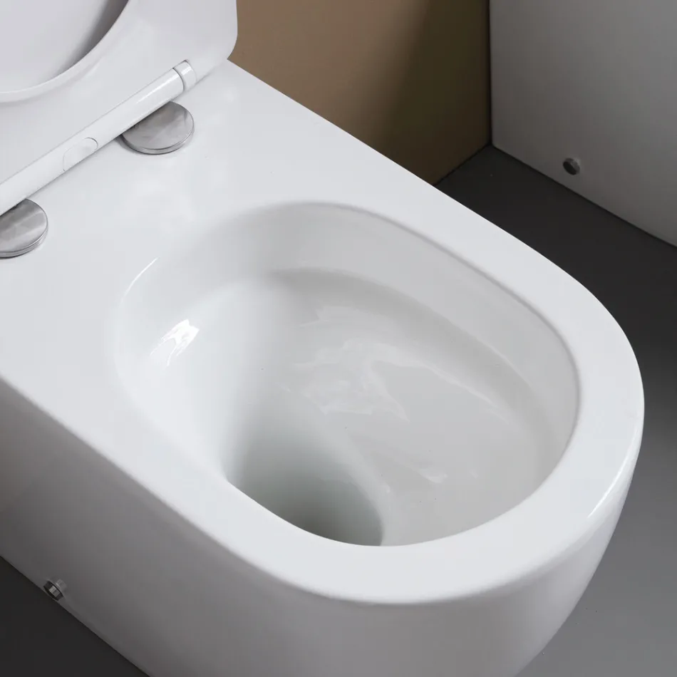 WC k podlaze s tlumeným dovíráním sedátka z bílé keramiky - Elm Viadurini