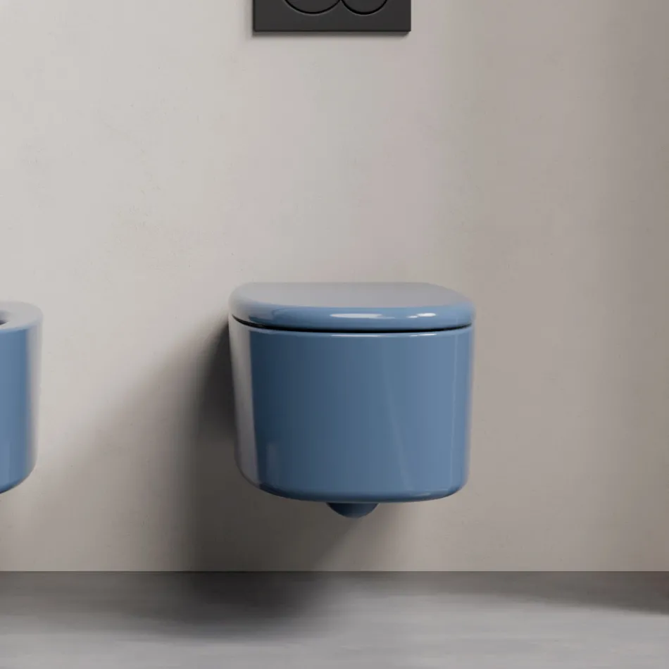 Závěsná keramická toaletní mísa v různých barvách vyrobená v Itálii - Dívka Viadurini